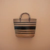 A brown and black striped woven bag for women's hand and shoulder casual tote bag Application Scenario